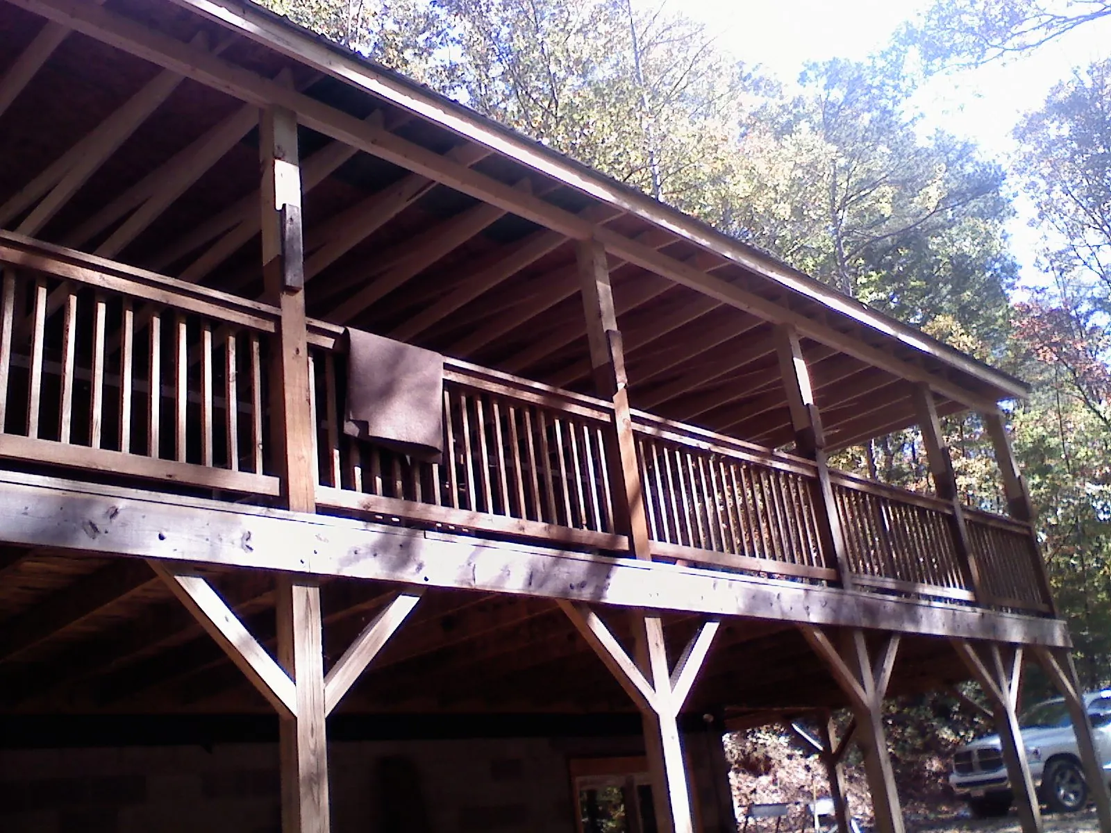 Timber framing under a new elevated porch and deck — Roof Leak Repair in Gratz by Roofing Brothers